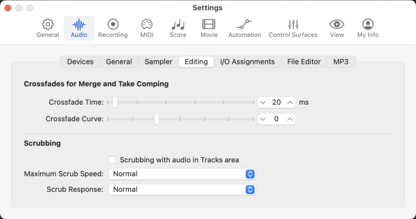 Logic Pro > Settings > Audio > Editing > Crossfades for Merge and Take Comping